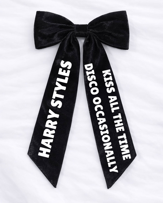 Harry styles long hair bow