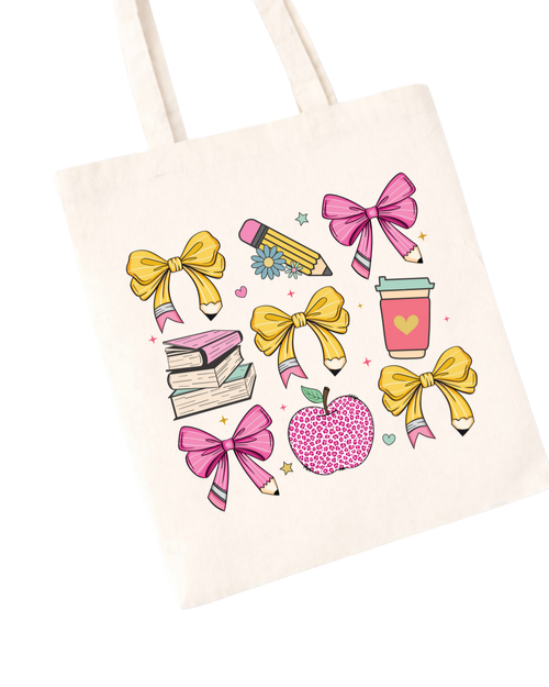 Pencil and bows tote bag